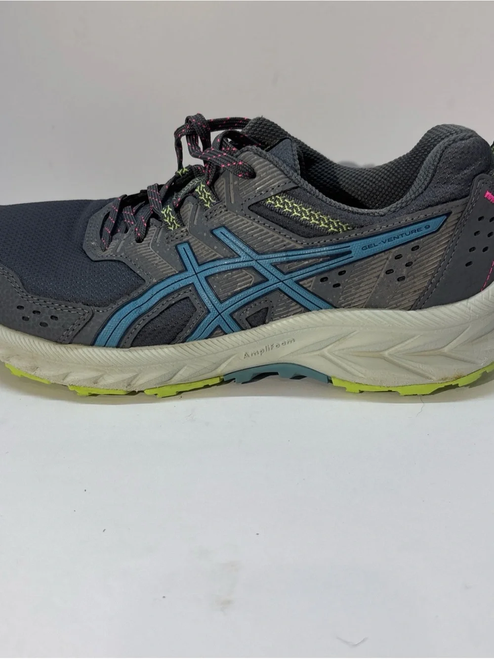 ASICS woman Gray Running Shoe with Blue Logo and Neon Accents  size 9